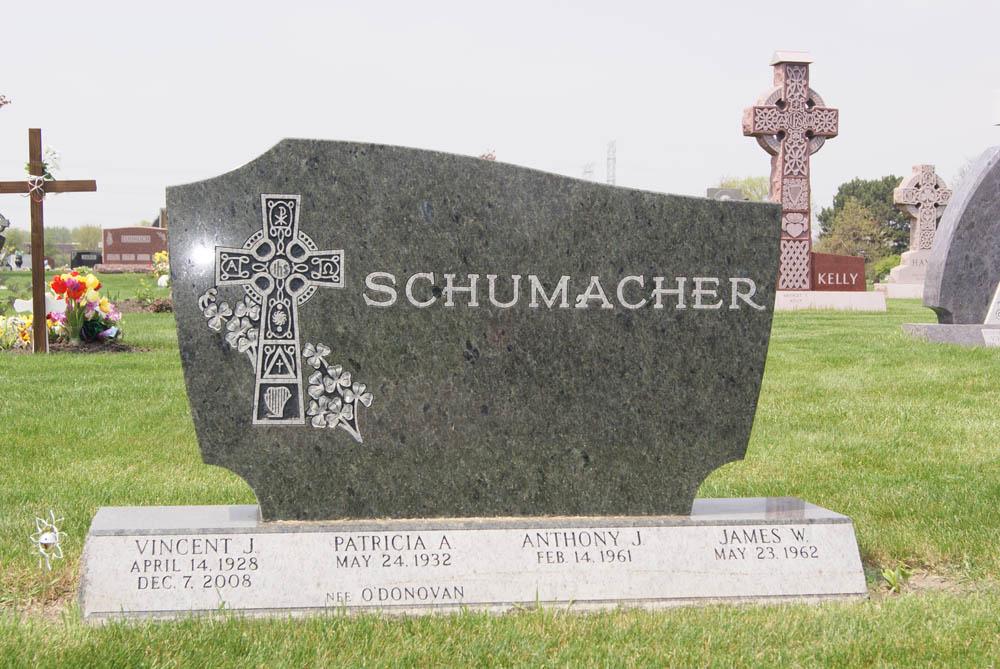Family monument made with green granite and with celtic cross and shamrocks