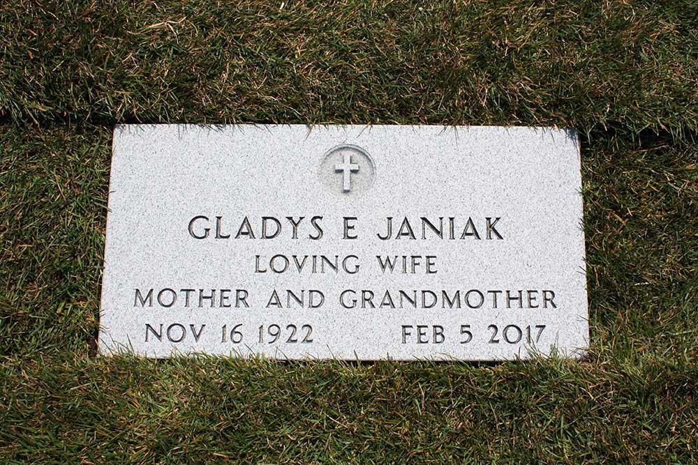 Grey granite veterans marker