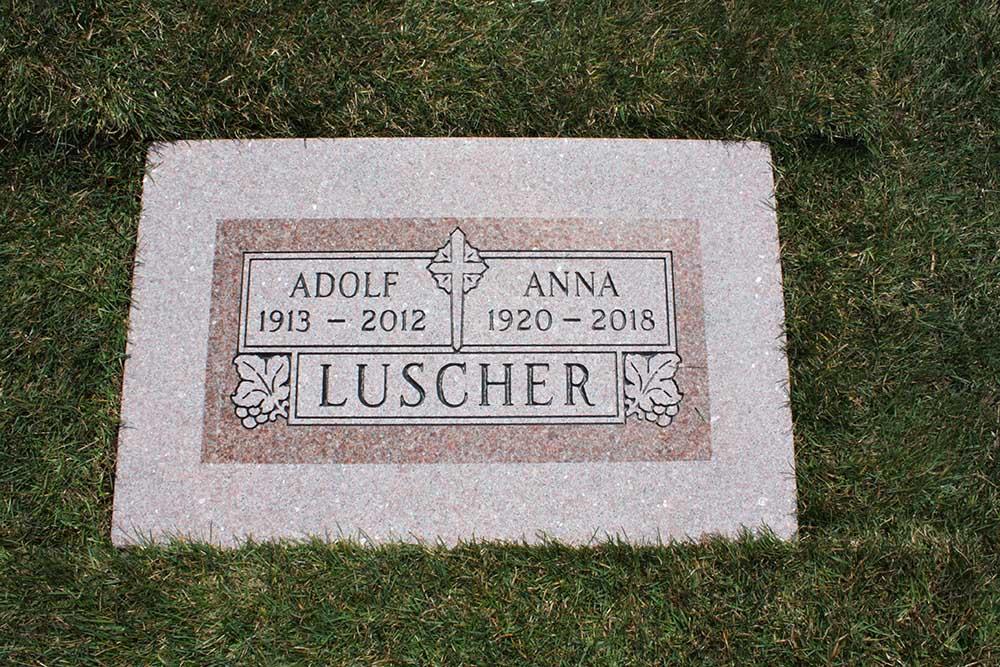 Rose colored marker with 2 names and integrated granite foundation