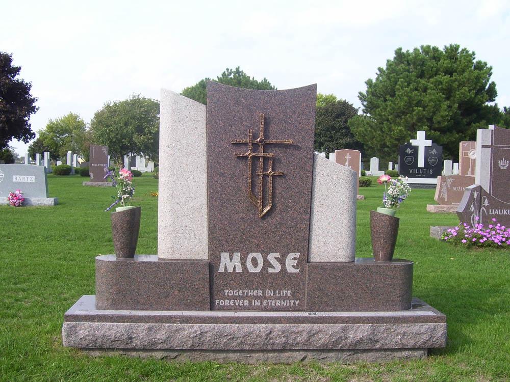Family monument in brown granite with contemporary cross