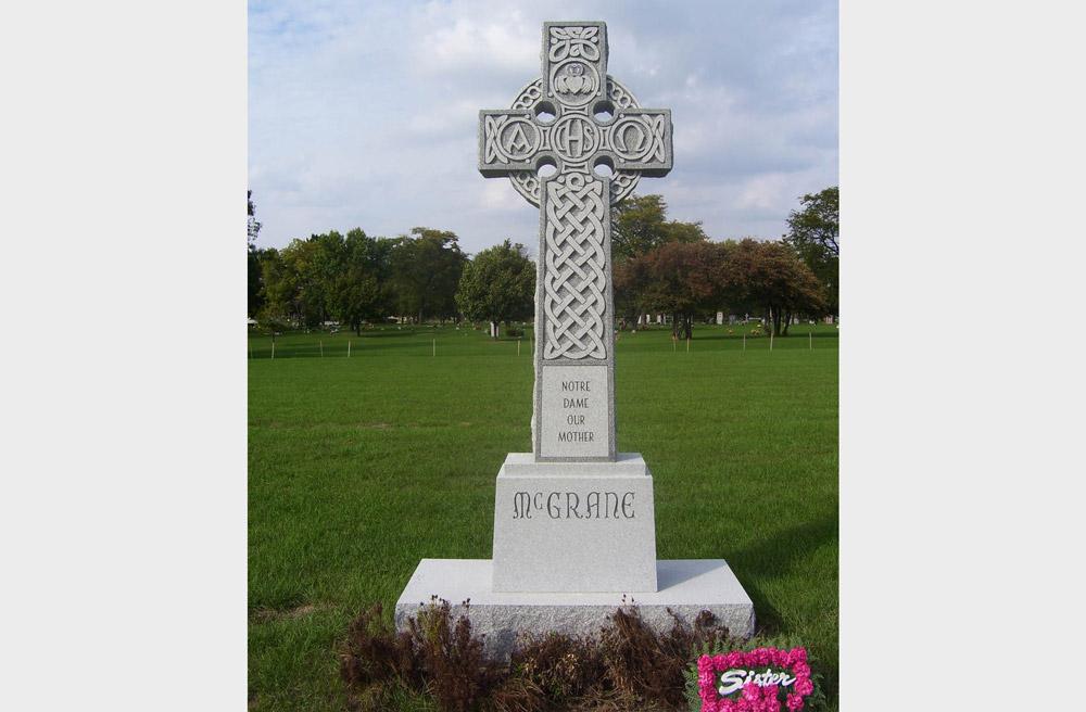 Family monument in gray granite with Celtic cross