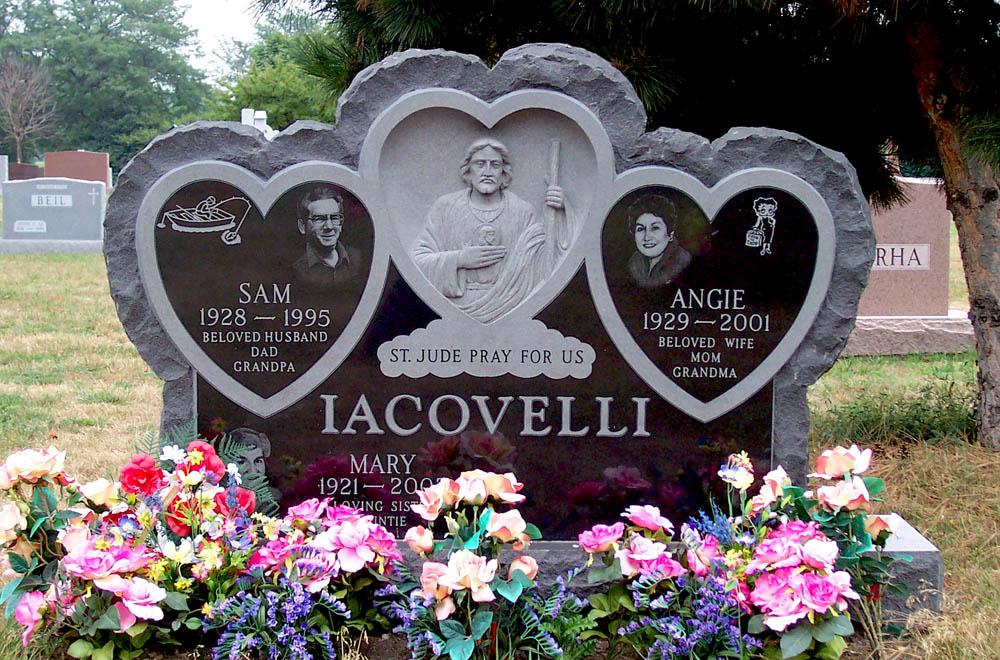 Heart shaped family monument with hand-etched portraits