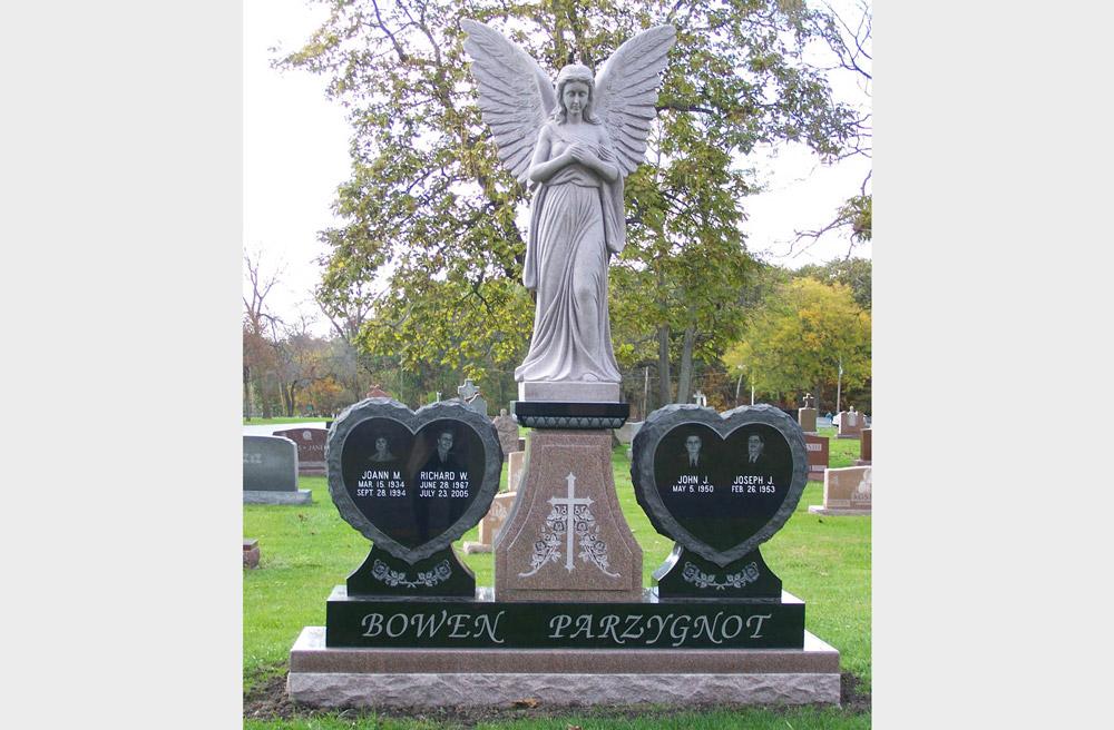 Family monument in multiple granite colors with heart shape and angel sculpture