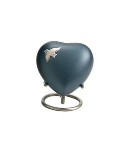Small dark teal heart shaped urn with silver bird