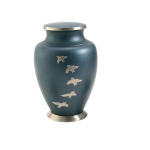 Large dark teal urn with silver birds flying and lid