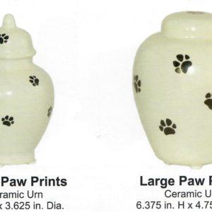 Small and large-sized white urns with printed paw prints
