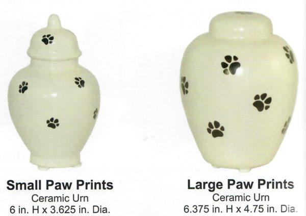 Small and large-sized white urns with printed paw prints
