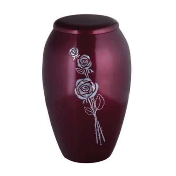 Large burgundy urn with large white flower