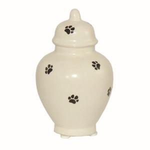 small ceramic urn with paws and round lid