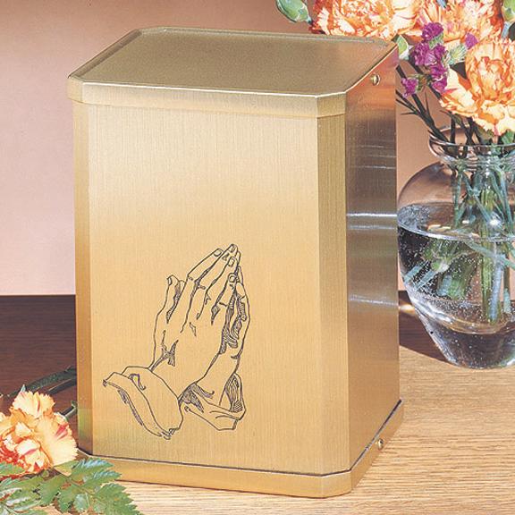 Large gold praying hand urn with lid